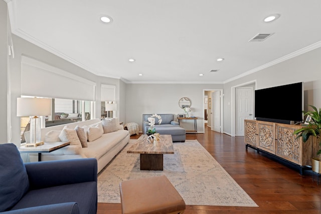 living room featuring dark wood-type flooring and crown molding