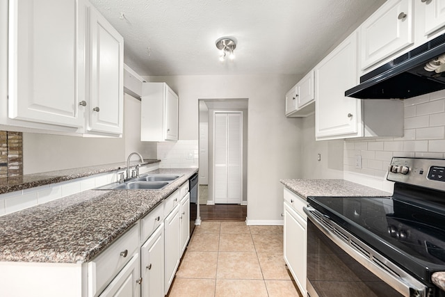 kitchen with electric stove, sink, dark stone countertops, black dishwasher, and white cabinets