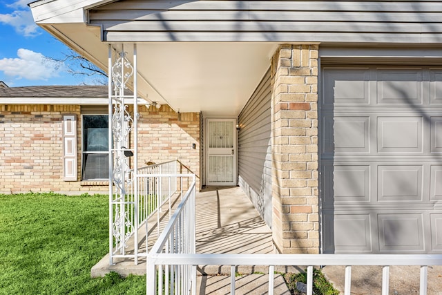 property entrance featuring a garage