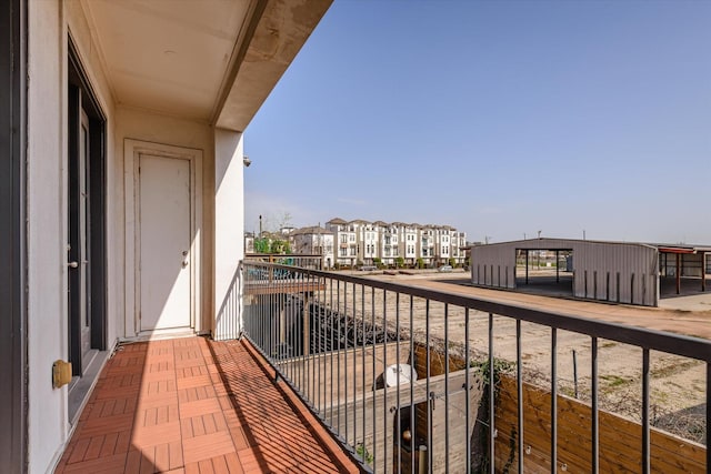 balcony featuring a residential view