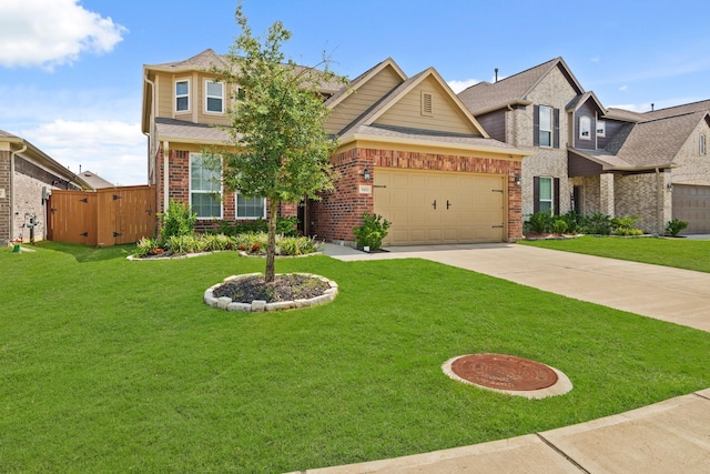 view of front of home with a garage and a front yard