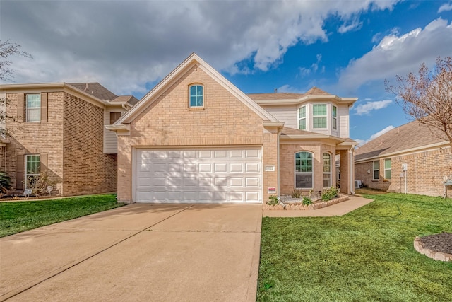 view of property featuring a garage and a front lawn