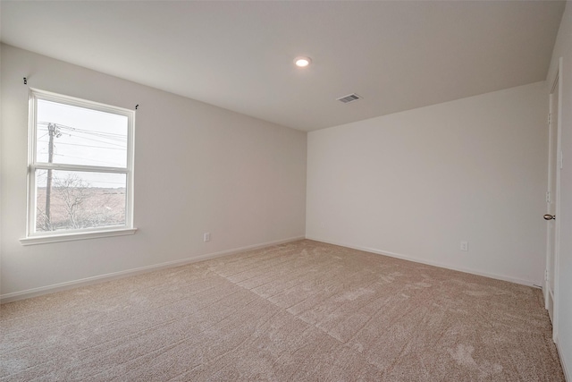 view of carpeted spare room