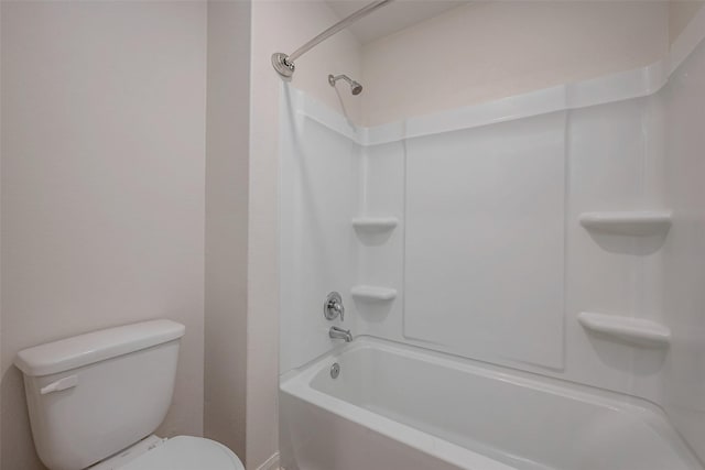 bathroom with shower / bathtub combination and toilet