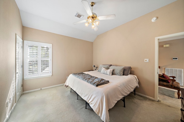 bedroom with lofted ceiling, light carpet, and ceiling fan