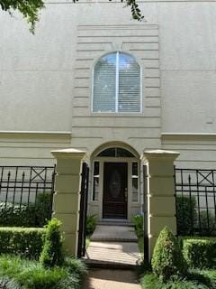 1515 Hyde Park Blvd Unit 1, Houston, TX 77006 - view of exterior entry featuring fence and stucco siding