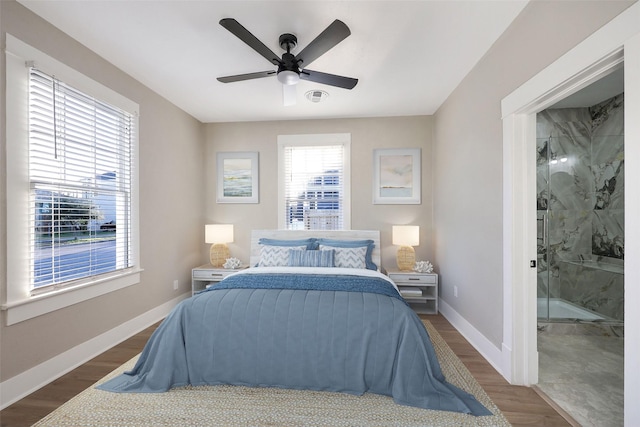 bedroom featuring dark wood-type flooring and ceiling fan