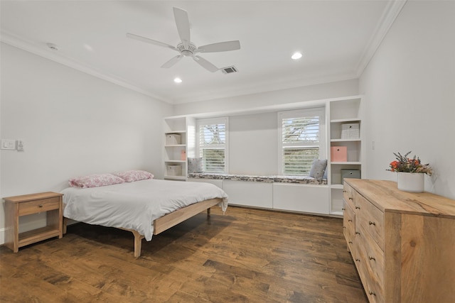 bedroom featuring ornamental molding, dark hardwood / wood-style floors, and ceiling fan