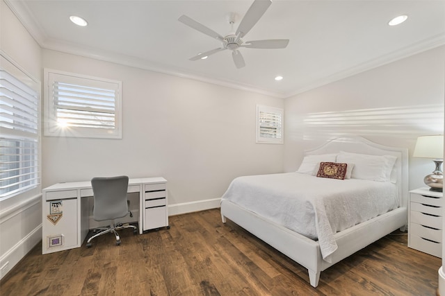 bedroom with ornamental molding, ceiling fan, and dark hardwood / wood-style flooring