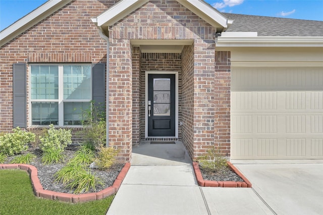 property entrance featuring a garage