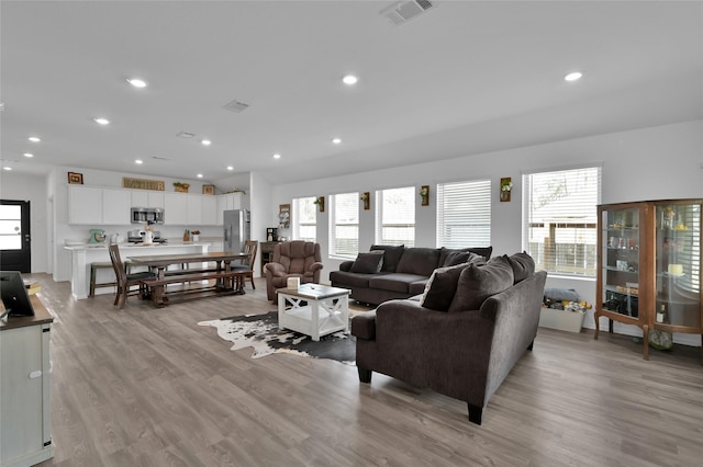 living room featuring light wood-type flooring