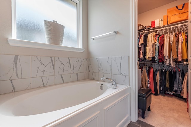 2230 Sand Lily Dr, Texas City, TX 77568 - full bathroom with a walk in closet and a garden tub