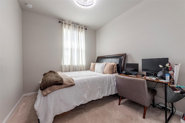 2230 Sand Lily Dr, Texas City, TX 77568 - bedroom featuring light colored carpet, baseboards, and lofted ceiling