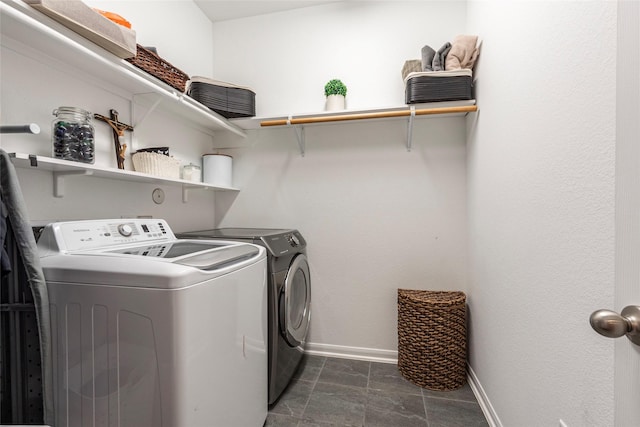 2230 Sand Lily Dr, Texas City, TX 77568 - laundry area with laundry area, baseboards, and washer and dryer