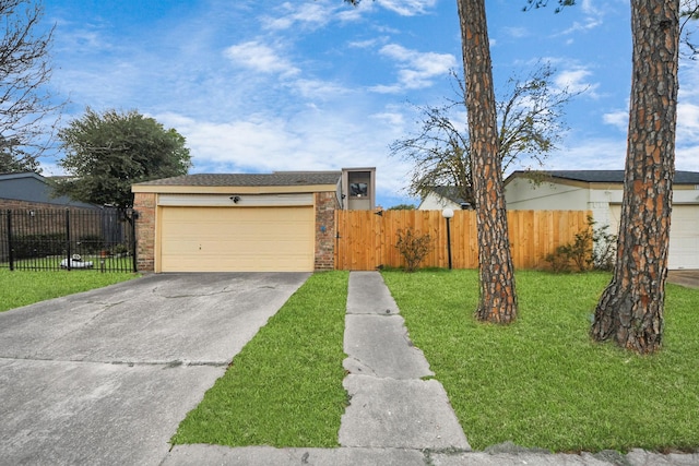 single story home with a garage and a front lawn