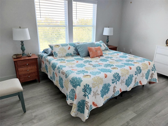 bedroom featuring hardwood / wood-style floors