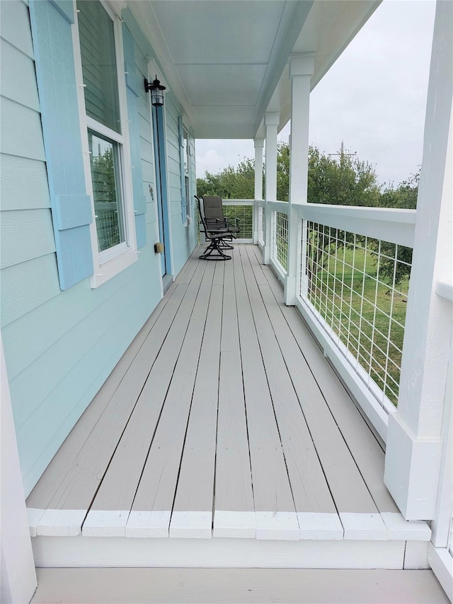 wooden terrace with covered porch