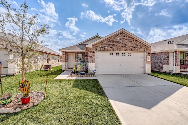 view of front of home with a garage, central AC, and a front yard