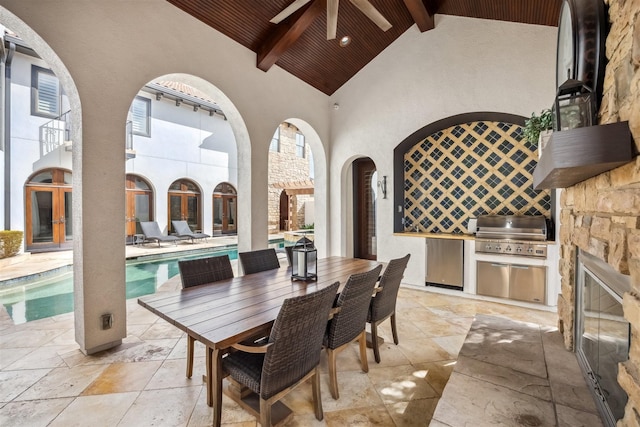 view of patio / terrace featuring area for grilling, grilling area, and ceiling fan