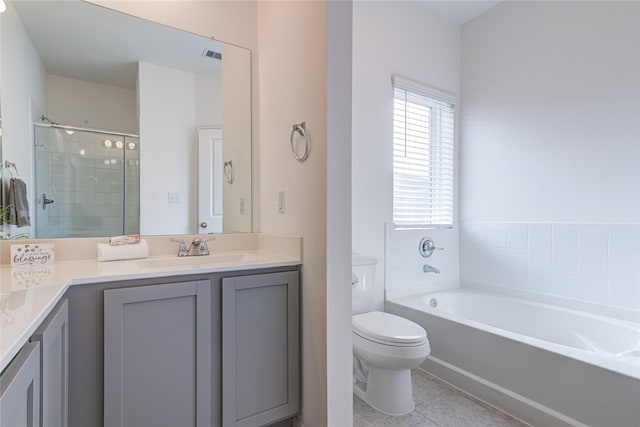 full bathroom with vanity, tile patterned floors, plus walk in shower, and toilet