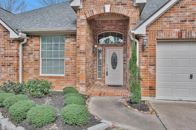 entrance to property with a garage