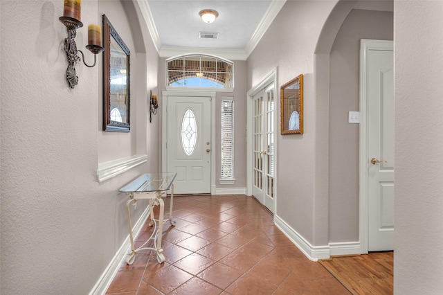 entrance foyer with crown molding