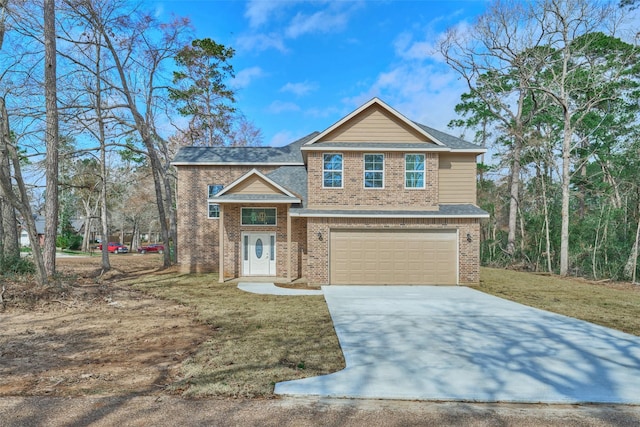 view of front of property featuring a garage and a front lawn