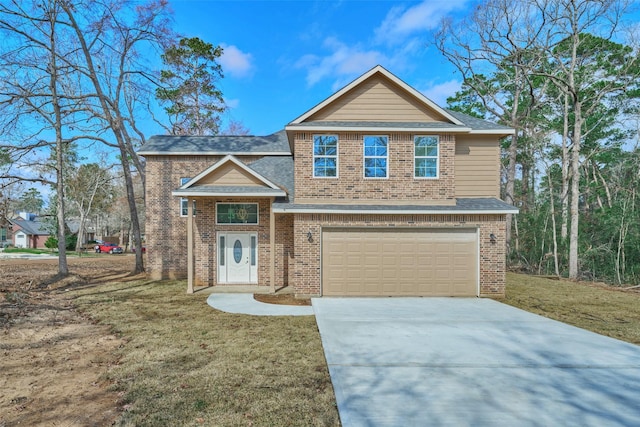 view of front of home featuring a garage and a front yard