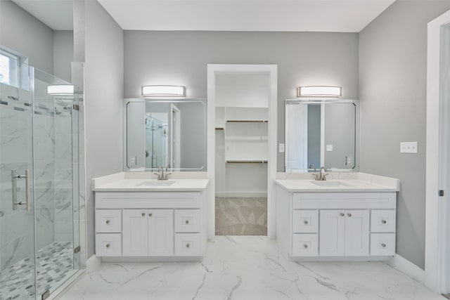110 Broken Wheel Cir, Conroe, TX 77316 - full bath featuring a marble finish shower, marble look tile flooring, baseboards, and two vanities