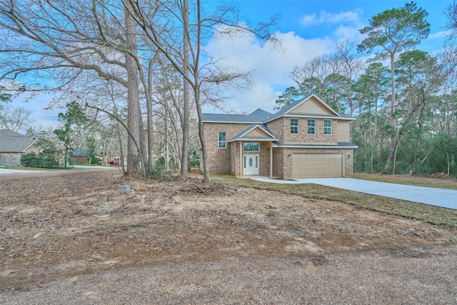 view of front of home with a garage