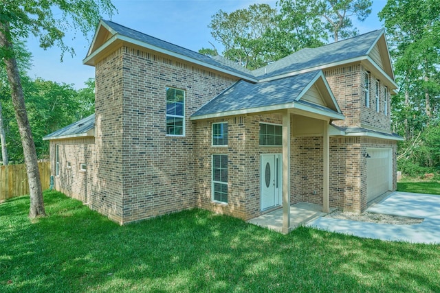 110 Broken Wheel Cir, Conroe, TX 77316 - rear view of property featuring brick siding, a garage, driveway, and roof with shingles