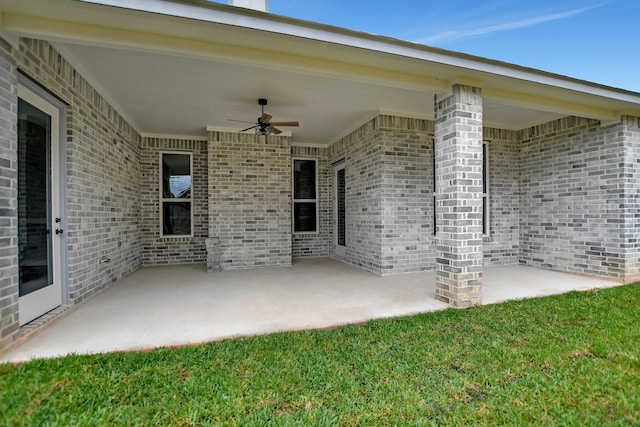 view of patio featuring ceiling fan