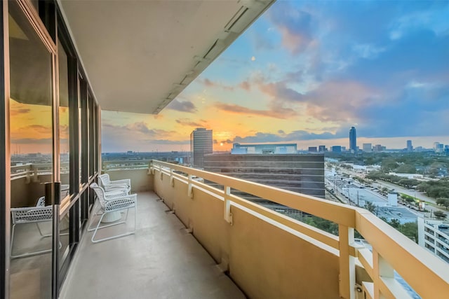 view of balcony at dusk