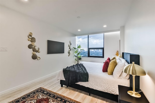 bedroom with wood-type flooring