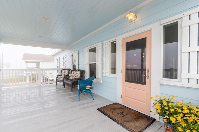 deck with covered porch