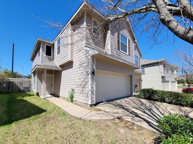 view of front of home featuring a garage, central AC, and a front lawn