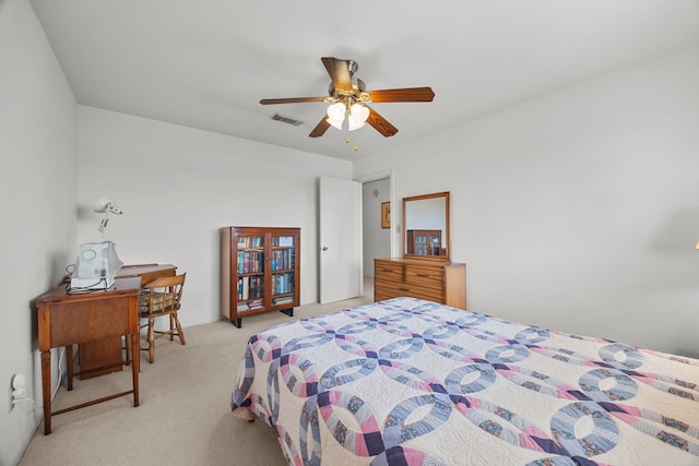 bedroom with light carpet and ceiling fan