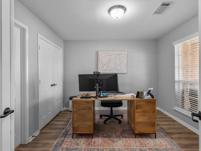 office area with dark hardwood / wood-style floors