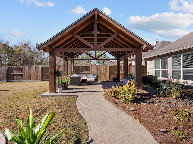 surrounding community featuring an outdoor living space, a gazebo, a yard, and a patio area