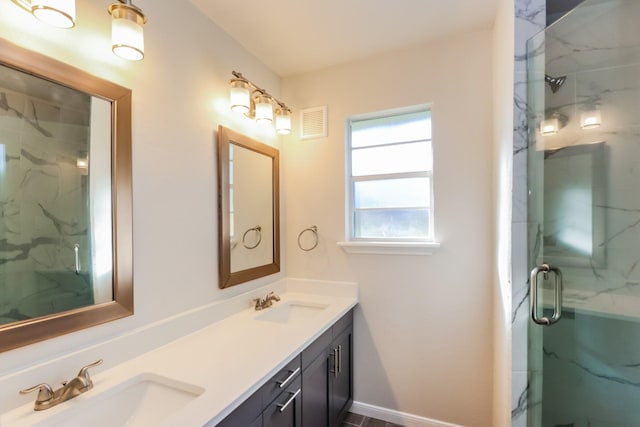 bathroom featuring vanity and walk in shower