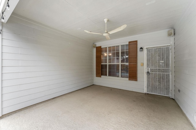 view of patio featuring ceiling fan