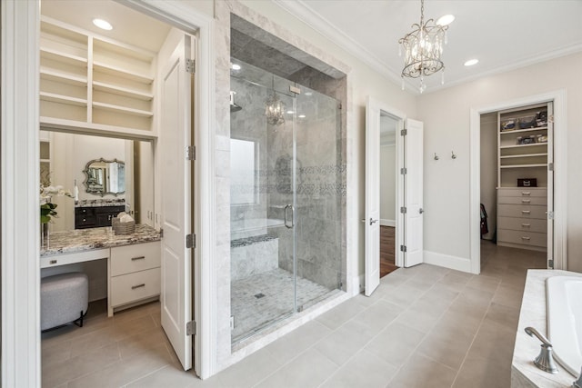 bathroom with independent shower and bath, crown molding, tile patterned flooring, and a notable chandelier