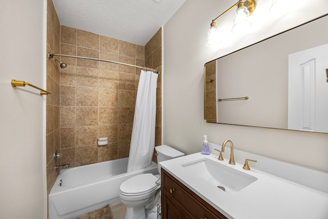 full bathroom featuring vanity, shower / bath combination with curtain, a textured ceiling, and toilet