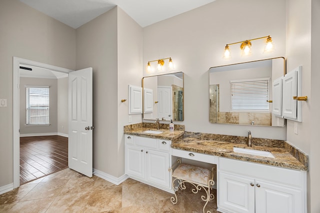 bathroom with vanity and tile patterned floors