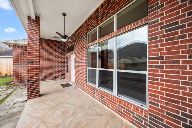 view of patio featuring ceiling fan