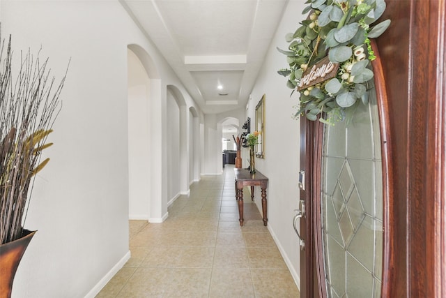 hallway featuring light tile patterned flooring