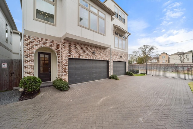 view of front of property featuring a garage