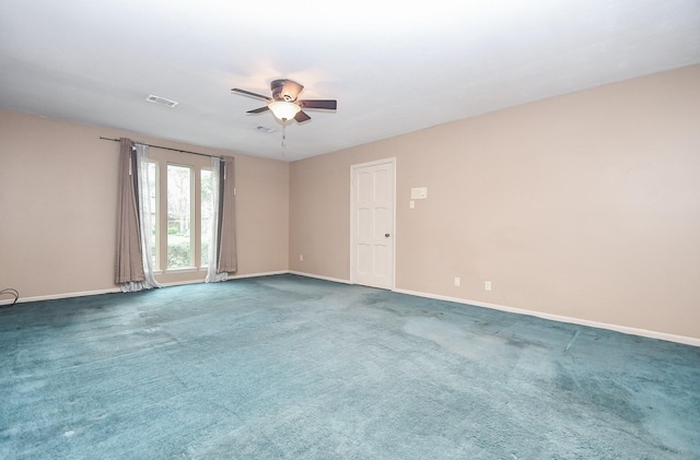 carpeted empty room with ceiling fan