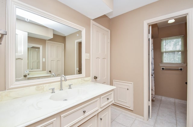 bathroom featuring vanity and tile patterned floors