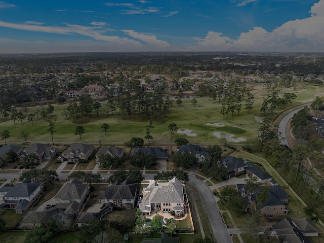 drone / aerial view featuring a residential view and view of golf course